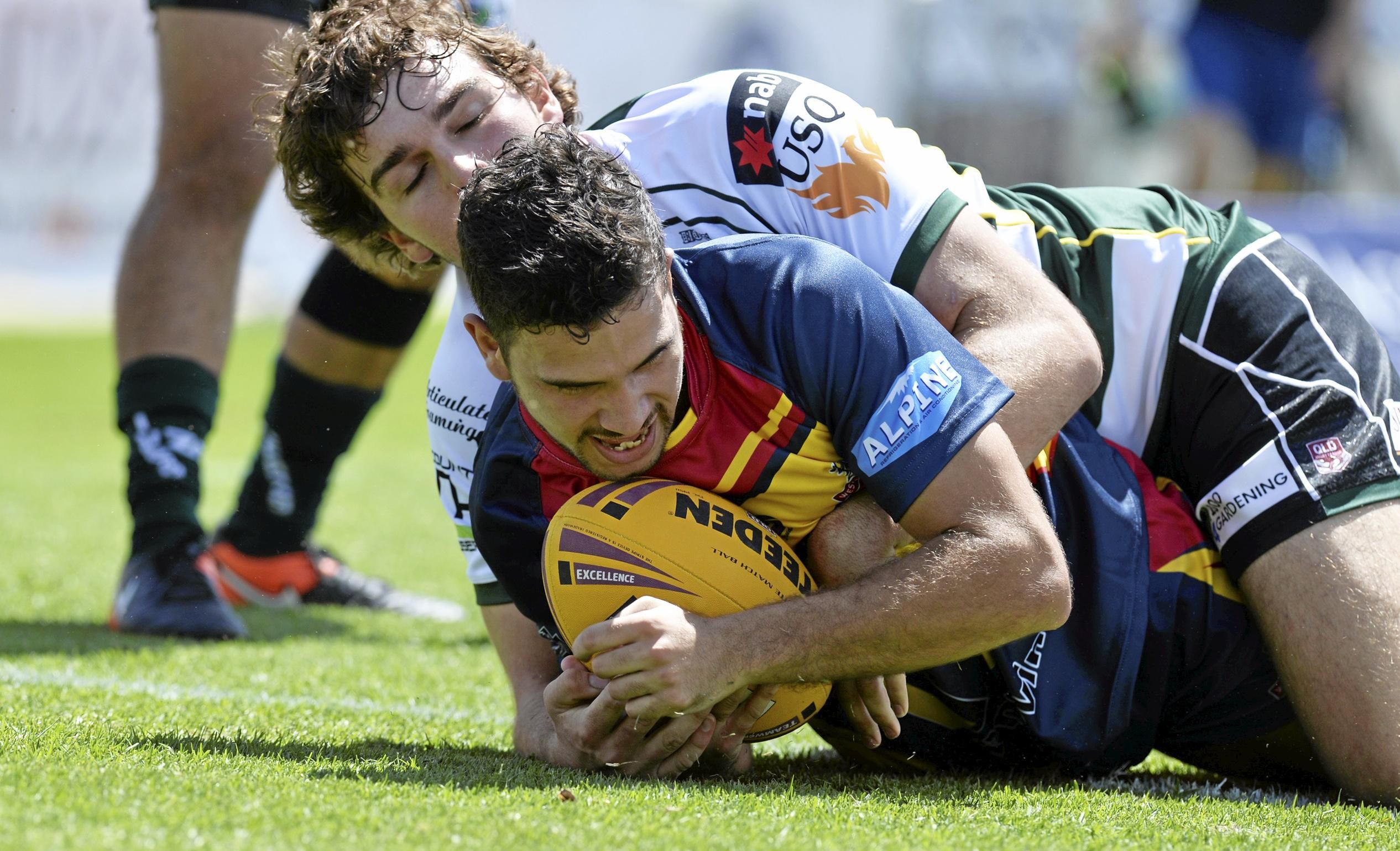 Wally Pegler crosses to try for Western Mustangs against Ipswich Jets in round 3 Colts under 20 rugby league at Clive Berghofer Stadium, Sunday, March 25, 2018. Picture: Kevin Farmer