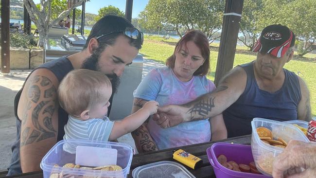 Dylan Glendenning with his son Lucean, mum Valda and dad Garry.