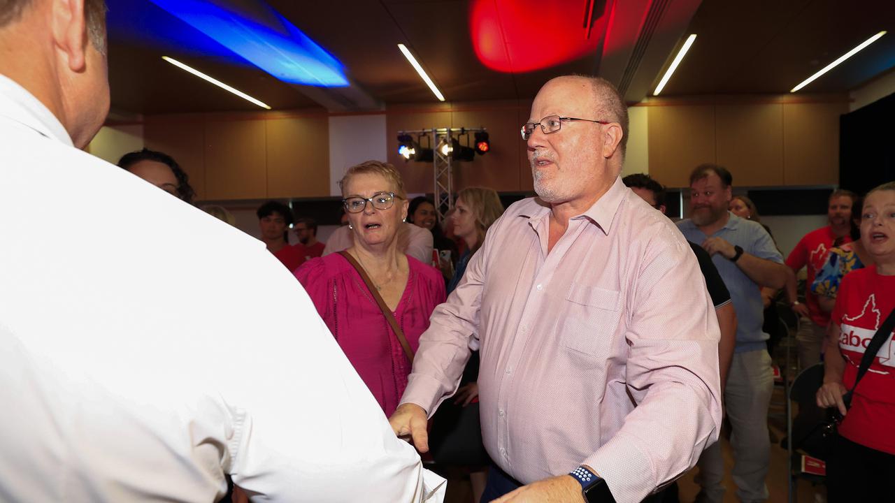 Premier Steven Miles shakes hands with Gary Bullock at Sunday’s launch. Picture: Adam Head