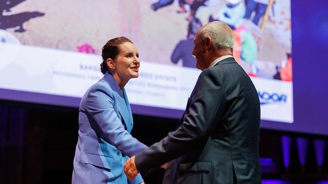 Manager Sales and Marketing at Moorhead Family Communities Bundaberg Grant Davies received the award from UDIA Queensland CEO Kirsty Chessher-Brown at the UDIA QLD Awards for Excellence 2023 at Brisbane City Hall on November 3. Photo: Jon W / Event Photos Australia