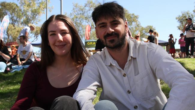 Naya from England and Vitto from Italy enjoying the Henley on Todd in Alice Springs, Saturday, August 17, 2024. Picture: Gera Kazakov