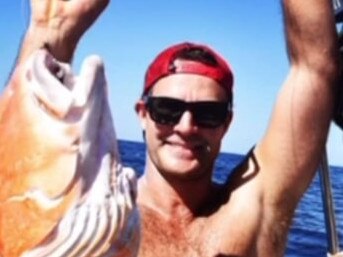 Mr Peck was taken to shore by boat after he was bitten by the shark while spearfishing.