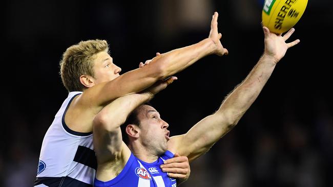 North Melbourne star Todd Goldstein outreaches Rhys Stanley. Picture: Quinn Rooney (Getty Images)