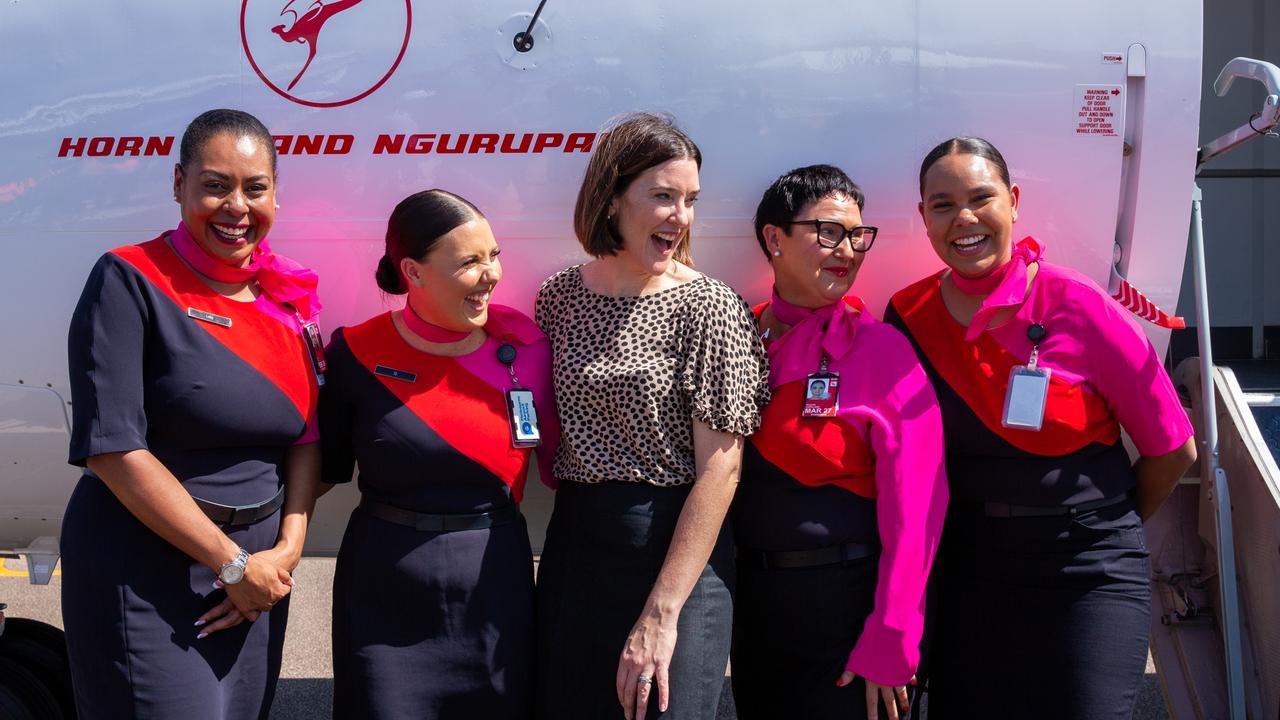 QantasLink Q400 aircraft named Horn Island. QantasLink chief executive Rachel Yangoyan with staff on the aircraft's first flight from Cairns to Horn Island. Picture: Qantas
