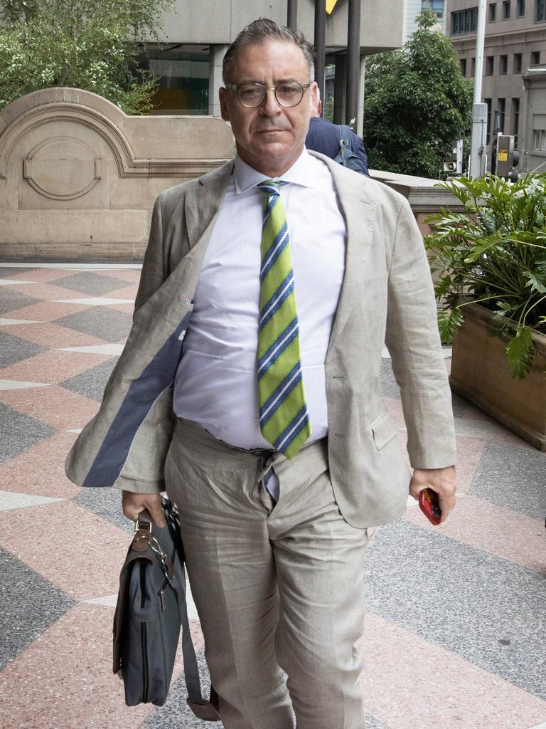 The former TV presenter while walking into court. Picture: NCA NewsWire / Brendan Read