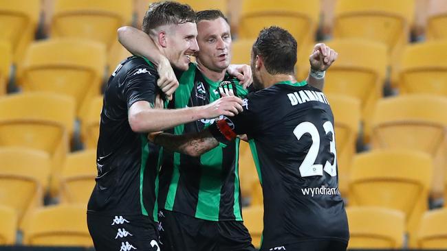 Western United’s Besart Berisha, centre, celebrates a goal against former club Brisbane Roar at Suncorp Stadium. Picture: Getty Images