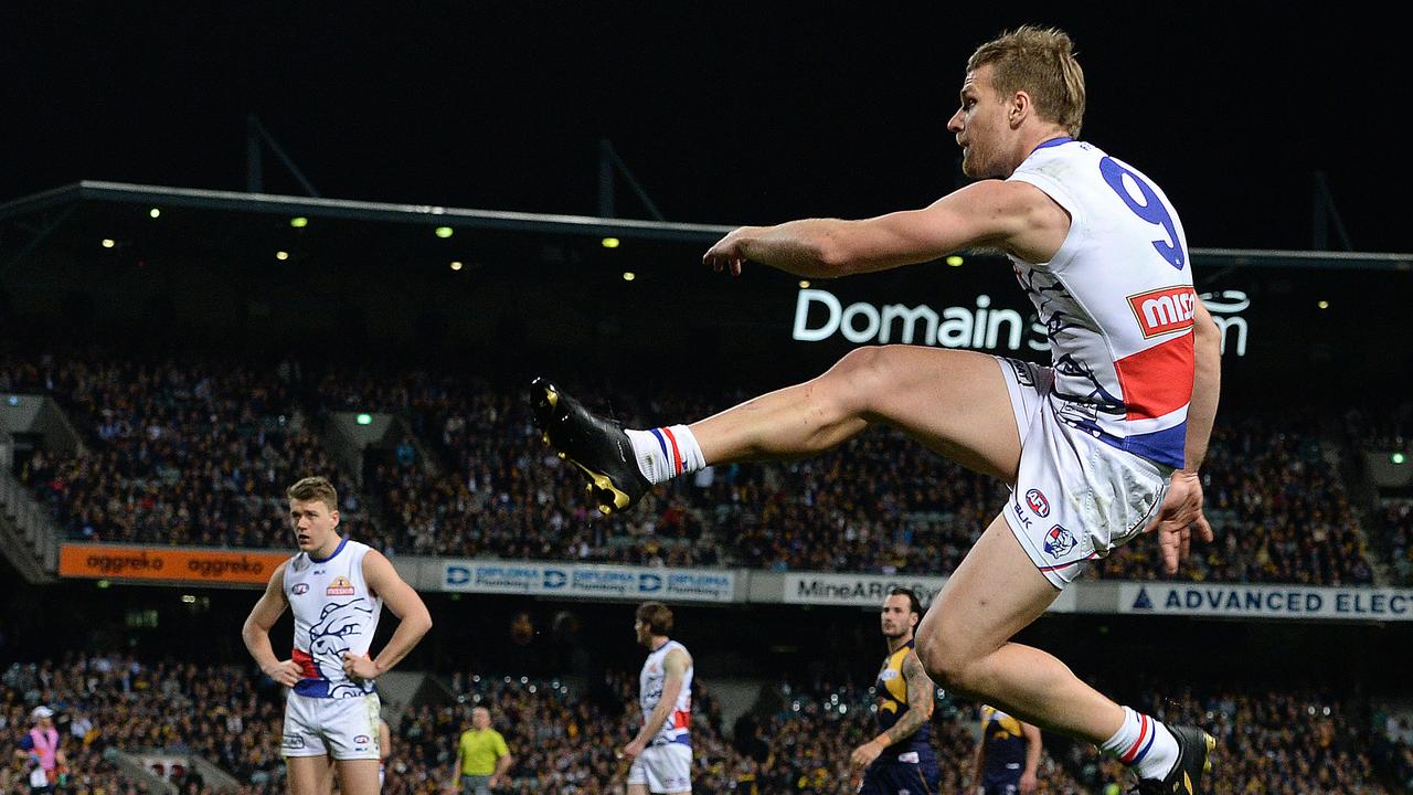 Stringer launches at goal. Picture: Daniel Wilkins