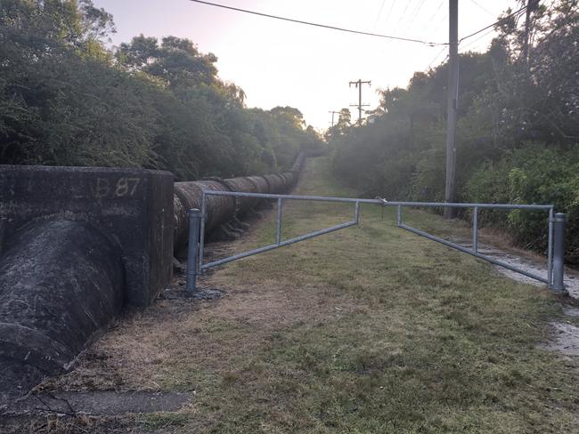 A section of the Sydney Water pipeline above ground near Mortain Ave, Allambie Heights. Picture: Jim O'Rourke