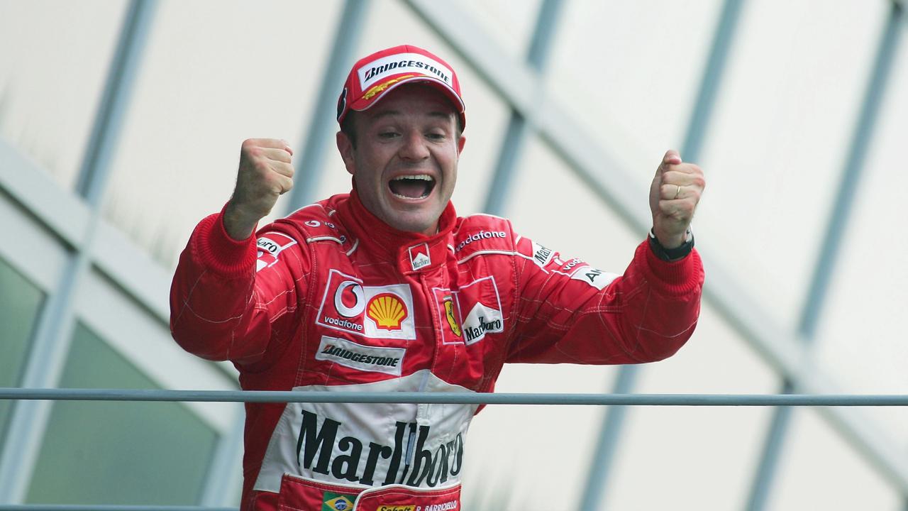 Barrichello celebrates after winning the Italian Grand Prix in 2004.