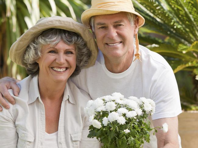 Senior couple looking at the camera in the garden Picture: iStock