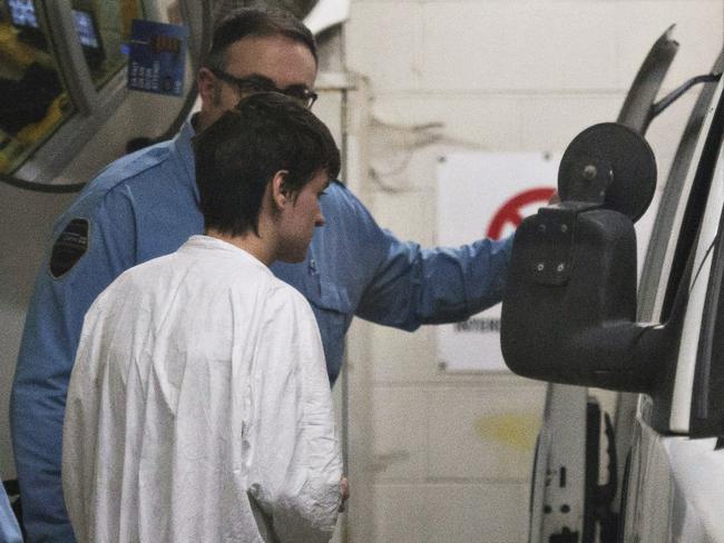 Alexandre Bissonnette is escorted to a van after appearing in court over a deadly shooting at a Quebec mosque. Picture: Jacques Boissinot/The Canadian Press via AP