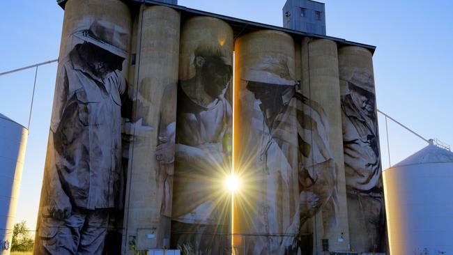 Silo art: The silos at Brim, near Warracknabeal, at sunrise. Picture: Supplied