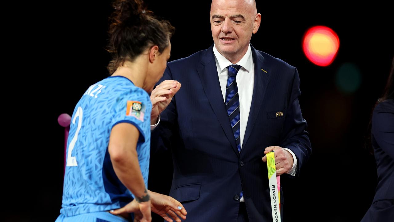 Infantino offers his hand to Bronze. She did not take it. Picture: Catherine Ivill/Getty Images