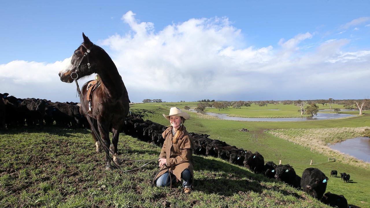 Shine nominee Sarah McLean with her horse, Max, and Te Mania Angus at Hexham. Picture: Yuri Kouzmin.