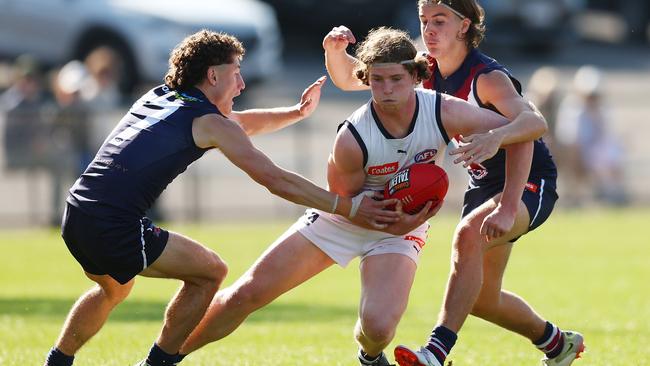 Patrick Hughes with the ball for the Geelong Falcons lasgt season. (Photo by Graham Denholm/AFL Photos via Getty Images)