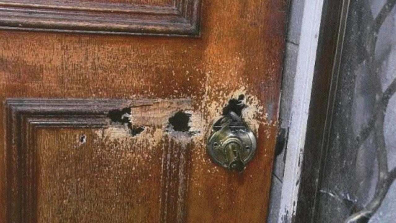 Nigel Hellings' door after Ben Hoffmann blew holes through it with a shotgun. Picture: Courts NT