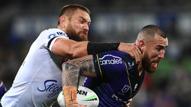 Nelson Asofa-Solomona is tackled by Jared Waerea-Hargreaves. Picture: Quinn Rooney/Getty Images