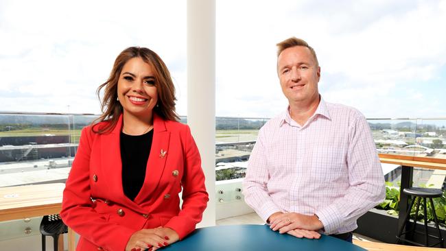 Destination Gold Coast chief executive Patricia O'Callaghan at Gold Coast Airport with Airport boss Chris Mills. Photo: Scott Powick