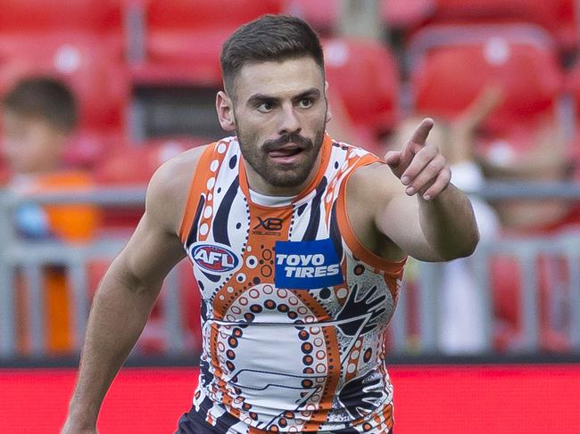 Stephen Coniglio of the Giants celebrates after scoring during the Round 11 AFL match between the GWS Giants and the Gold Coast Suns at the Sydney Showground Stadium in Sydney, Saturday, June 1, 2019. (AAP Image/Craig Golding) NO ARCHIVING, EDITORIAL USE ONLY