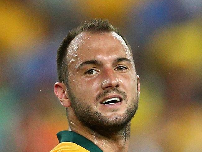 SYDNEY, AUSTRALIA - JANUARY 13: Ivan Franjic of the Socceroos reacts during the 2015 Asian Cup match between Oman and Australia at ANZ Stadium on January 13, 2015 in Sydney, Australia. (Photo by Cameron Spencer/Getty Images)