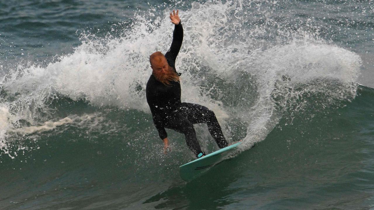 Blake Johnston surfed for more than 30 hours. (Photo by Saeed KHAN / AFP)
