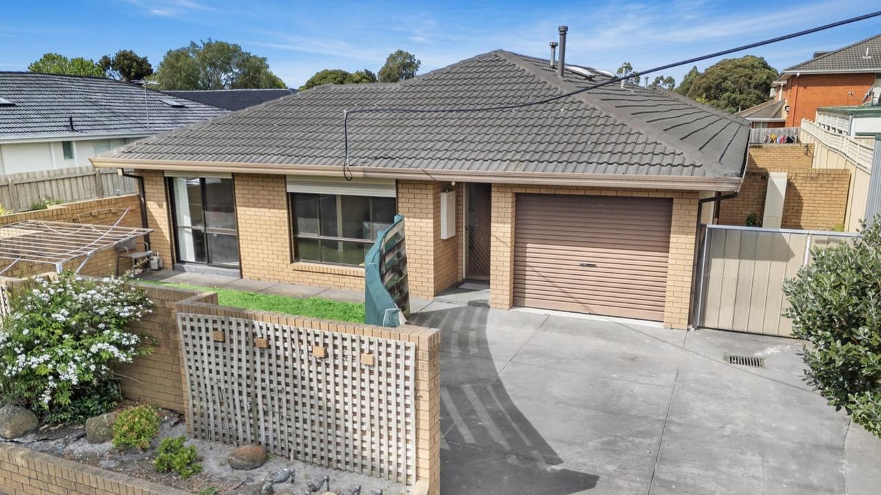 There were smiles all around at the auction as the three first homebuyer couples snagged one of three Oakleigh South units.