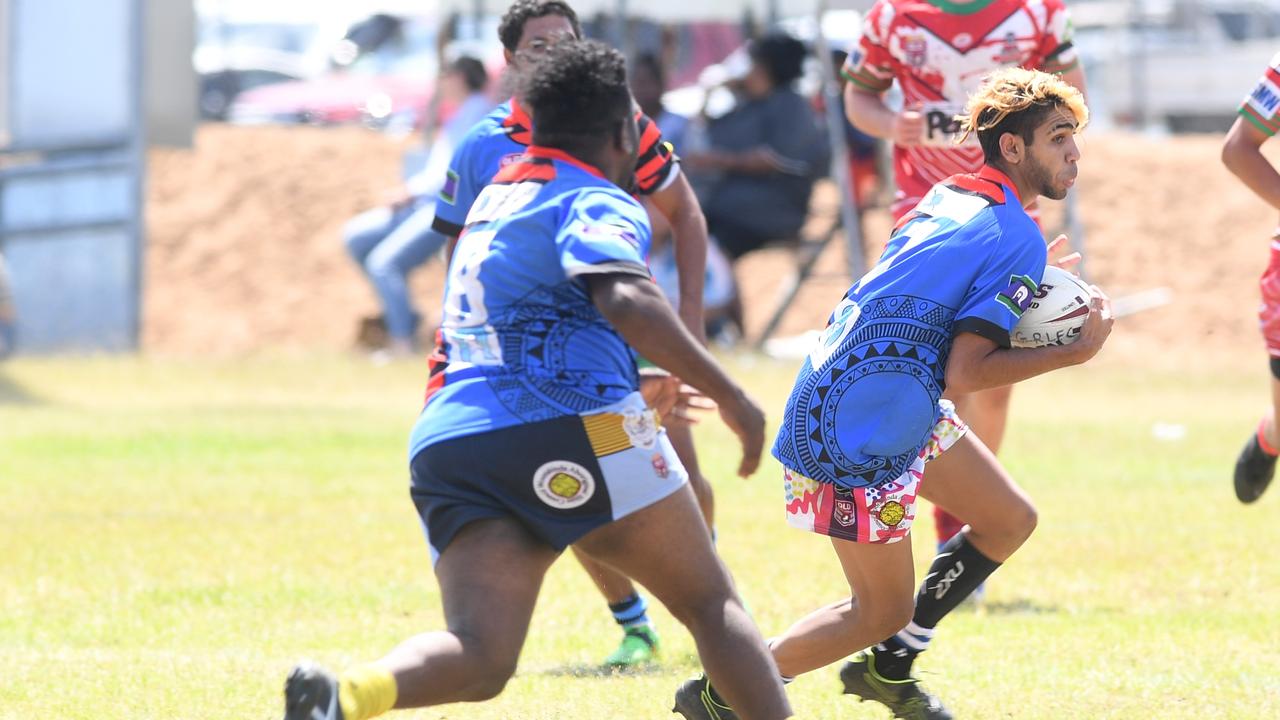 RUGBY LEAGUE - A DAY AT THE PARK: Woorabinda Warriors I's Malachi Hill with the ball