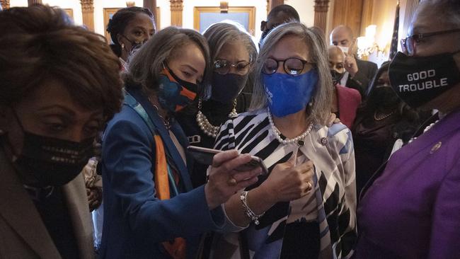 Members of the Congressional Black Caucus, including Maxine Waters (L) watch the news break over the verdict in the Derick Chauvin murder trial. Picture: AFP.