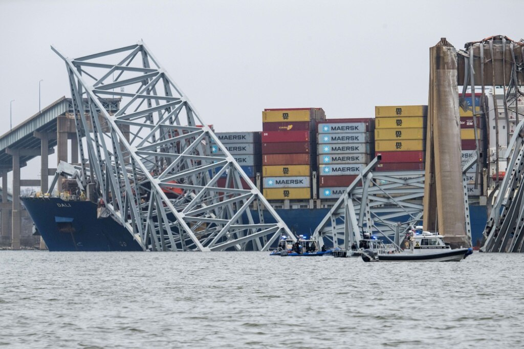 Baltimore bridge response shifts to recovery of six missing