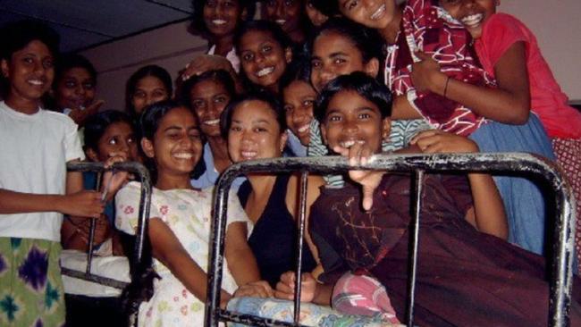 Sue Liu with some of the Sri Lankan children she has been helping.