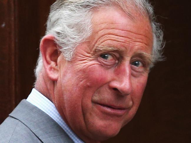 LONDON, ENGLAND - JULY 23: Prince Charles, Prince of Wales arrives at The Lindo Wing before visiting Catherine, Duchess Of Cambridge and her newborn son at St Mary's Hospital on July 23, 2013 in London, England. The Duchess of Cambridge yesterday gave birth to a boy at 16.24 BST and weighing 81b 6oz, with Prince William at her side. The baby, as yet unnamed, is third in line to the throne and becomes the Prince of Cambridge. (Photo by Oli Scarff/Getty Images)