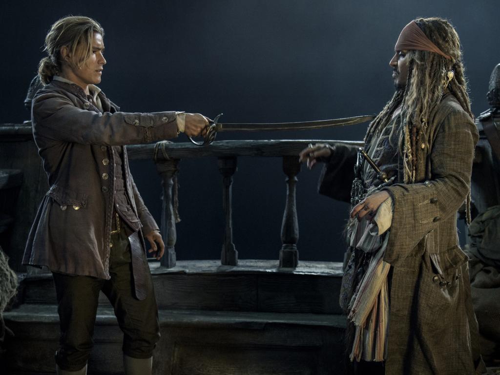 Brenton Thwaites and Johnny Depp in a scene from Pirates of the Caribbean: Dead Men Tell No Tales.