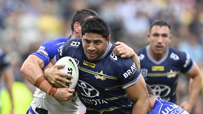 Jason Taumalolo of the Cowboys is tackled during the round one NRL match between the North Queensland Cowboys and the Canterbury Bulldogs at Qld Country Bank Stadium, on March 13, 2022, in Townsville, Australia. (Photo by Ian Hitchcock/Getty Images)