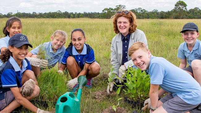 Suellen Fitzgerald with (l-r) Beresford Road Public School Greystanes students Rabia Akbari Malik Amin, Mac Hunt, Arijana Zammit-Kaipo, Jackson Laybutt and Jamey Bullus at Bungarribee Park.