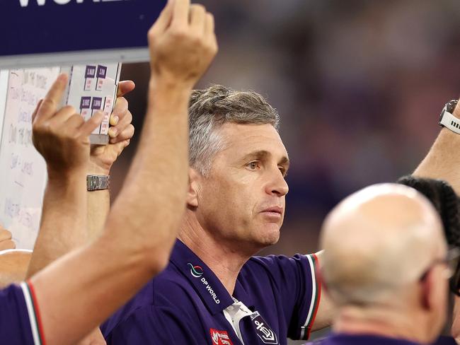 Justin Longmuir addressing his troops. The Fremantle mentor said the AFL has left WA clubs out in the cold over travel disadvantages. Picture: Will Russell/AFL Photos via Getty Images.