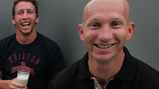 Daily Telegraph. L to R, Newcastle Knights players Chris Houston and Kurt Gidley with former player Adam MacDougall at Gidley's home in Newcastle. MacDougall has launched a meal replacement drink called "The Man Shake" (pictured).