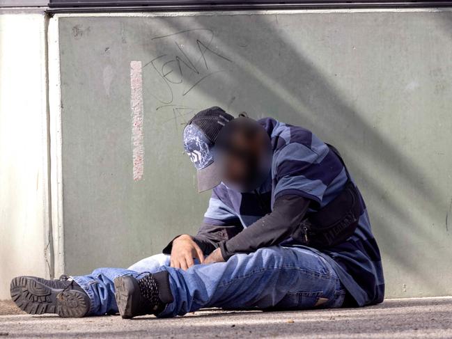 A man nods off after injecting heroin at the safe injecting room in Richmond. Picture: David Geraghty