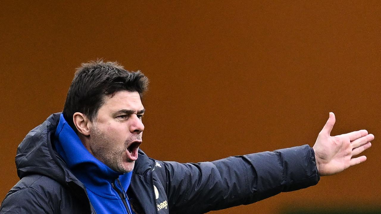 Chelsea's Argentinian head coach Mauricio Pochettino reacts during the English Premier League football match between Wolverhampton Wanderers and Chelsea at the Molineux stadium in Wolverhampton, central England on December 24, 2023. (Photo by Paul ELLIS / AFP) / RESTRICTED TO EDITORIAL USE. No use with unauthorized audio, video, data, fixture lists, club/league logos or 'live' services. Online in-match use limited to 120 images. An additional 40 images may be used in extra time. No video emulation. Social media in-match use limited to 120 images. An additional 40 images may be used in extra time. No use in betting publications, games or single club/league/player publications. /