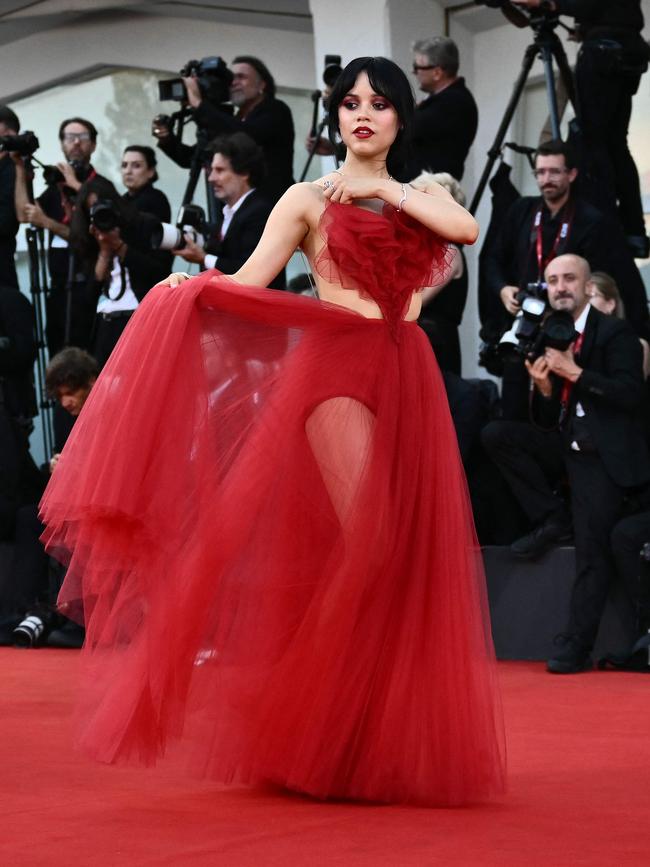 The designer gown was somewhat see-through too. Picture: Marco BERTORELLO / AFP