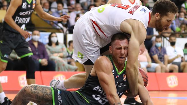 Jarred Bairstow of the Wildcats tangles with Mitchell Creek of the Phoenix and during last year’s NBL season. (Photo by Mike Owen/Getty Images)