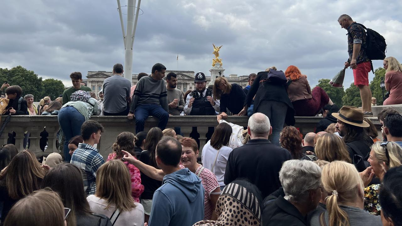 The police officer’s order for people to stop climbing was ignored. Picture: Chantelle Francis