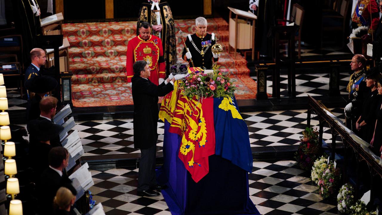 The Imperial State Crown is removed from the coffin of Queen Elizabeth II during the Committal Service at St George's Chapel. Picture: Getty Images