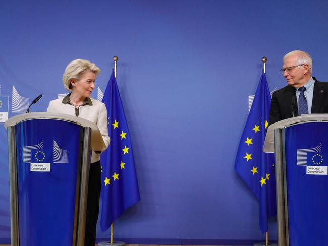 European Commission President Ursula von der Leyen (L) and  European Union for Foreign Affairs and Security Policy Josep Borrell give a joint press statement on further measures to respond to the Russian invasion of Ukraine  at the European Commission in Brussels on February 27, 2022. (Photo by Stephanie LECOCQ / POOL / AFP)