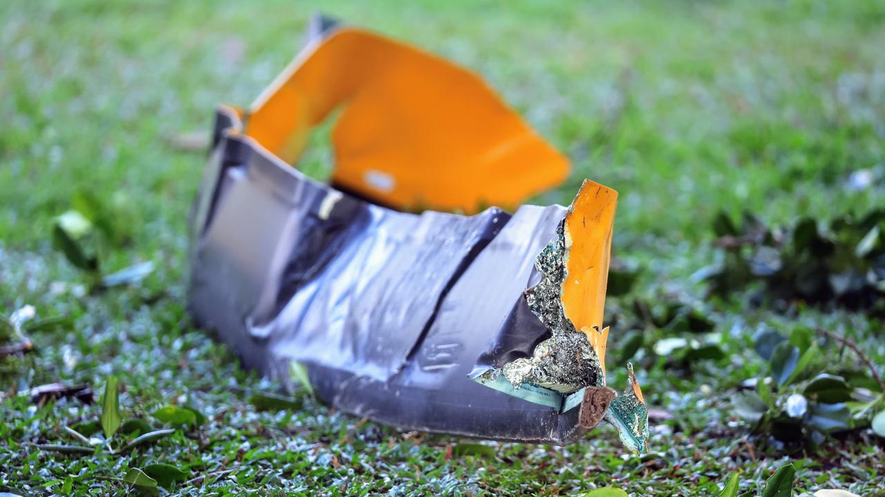 Part of the rotor blade in parkland on the opposite side of the Esplanade. Picture: NewsWire / Brendan Radke