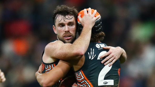 Giants Darcy Jones celebrates with Brent Daniels after kicking a goal during the GWS Giants v Carlton Round 17 AFL match at ENGIE Stadium, Sydney on July 6, 2024.. Photo by Brett Costello(Image Supplied for Editorial Use only - **NO ON SALES** - Â©Brett Costello )