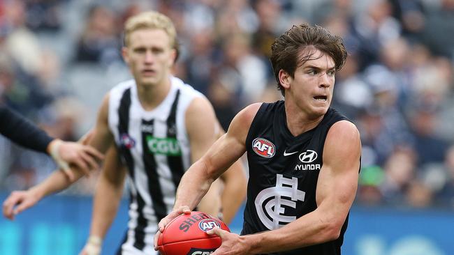 AFL Round 8. Carlton v Collingwood at the MCG. 10/05/2019. Paddy Dow of the Blues escapes from the stoppage 3rd quarter. Pic: Michael Klein.