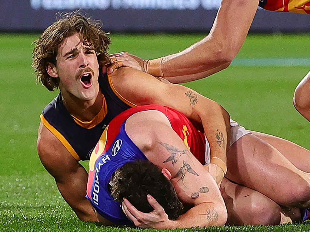 James Peatling reacts after being reported for a tackle on Lachie Neale.