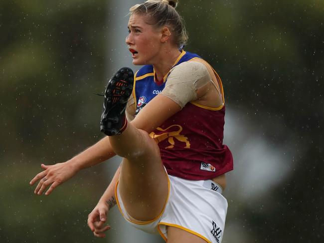 MELBOURNE, AUSTRALIA - FEBRUARY 5: Tayla Harris of the Lions kicks the ball during the 2017 AFLW Round 01 match between the Melbourne Demons and the Brisbane Lions at Casey Fields on February 5, 2017 in Melbourne, Australia. (Photo by Michael Willson/AFL Media/Getty Images)