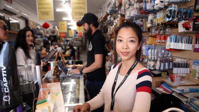 Small business owners Joe and Lisa Nguyen pictured in their shop on John St in Cabramatta. Picture: Sam Ruttyn