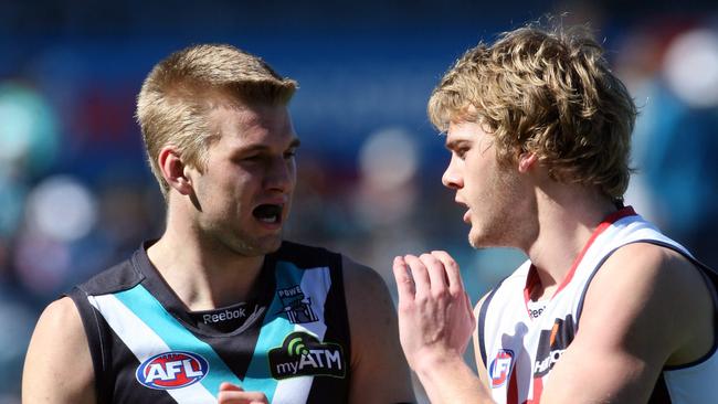 Outgoing Port Adelaide swingman Jackson Trengove and out-of-favour Melbourne forward Jack Watts in younger times.